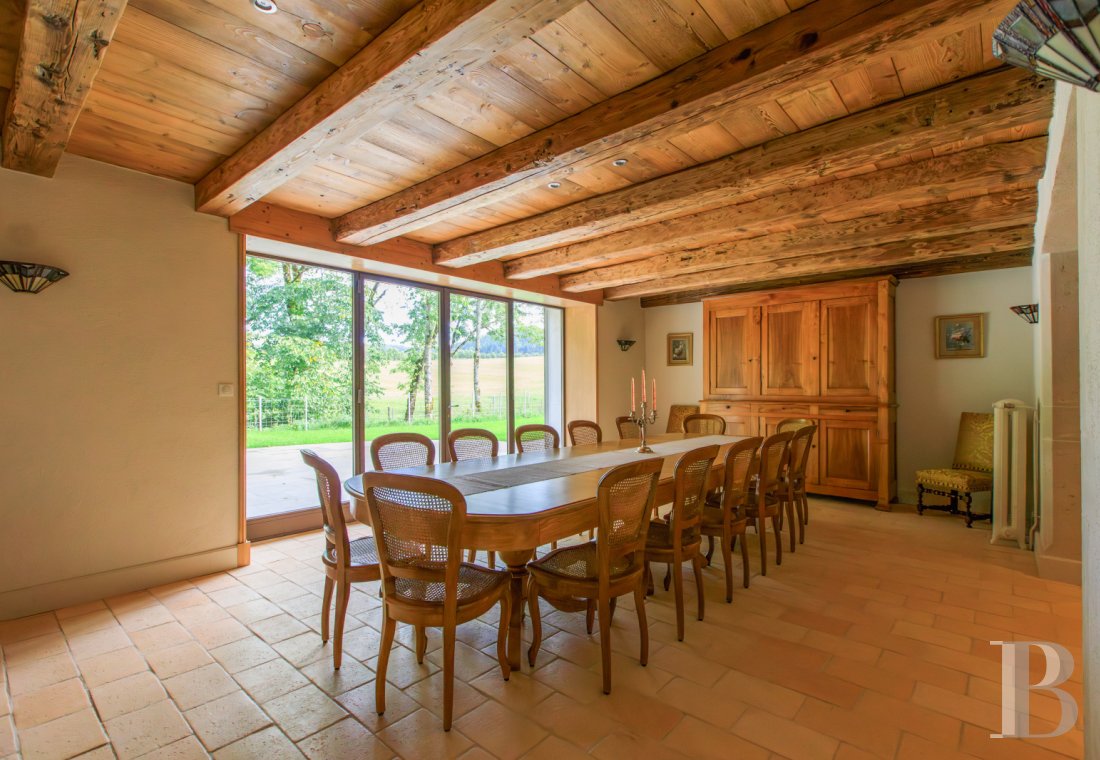 A former livestock farm which has been transformed into a vast, comfortable home near to Nantua in the Haut-Bugey region - photo  n°8